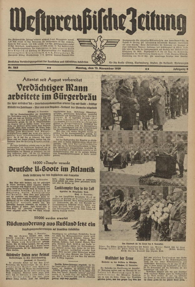Schwarze-weiße Titelseite einer deutschen Zeitung vom 13. November 1939 mit der Überschrift 'Weitpreubliche Zeitung', die eine Gruppe von Menschen in traditioneller deutscher Tracht in einer feierlichen Szenerie zeigt.