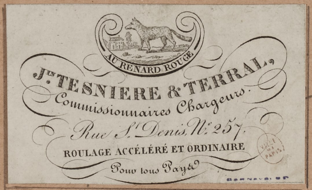 Eine abgenutzte Geschäftskarte mit einem Hundebild in der Mitte und gedrucktem Text.