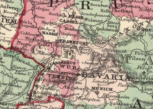 Eine alte Deutschlandkarte mit hervorgehobenen bayerischen Provinzen, dicht beschriftet mit Text.